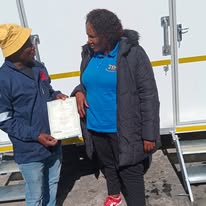 A customer moment at JTM Trailers